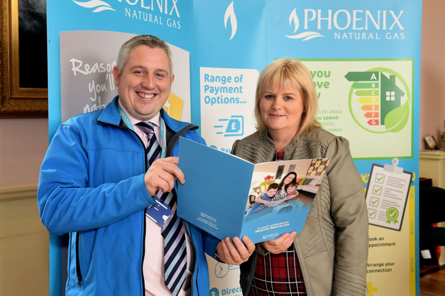 Local resident Beverley Allen is pictured with Energy Advisor, John Graham, at the natural gas information stand in the Irish Linen Centre & Lisburn Museum