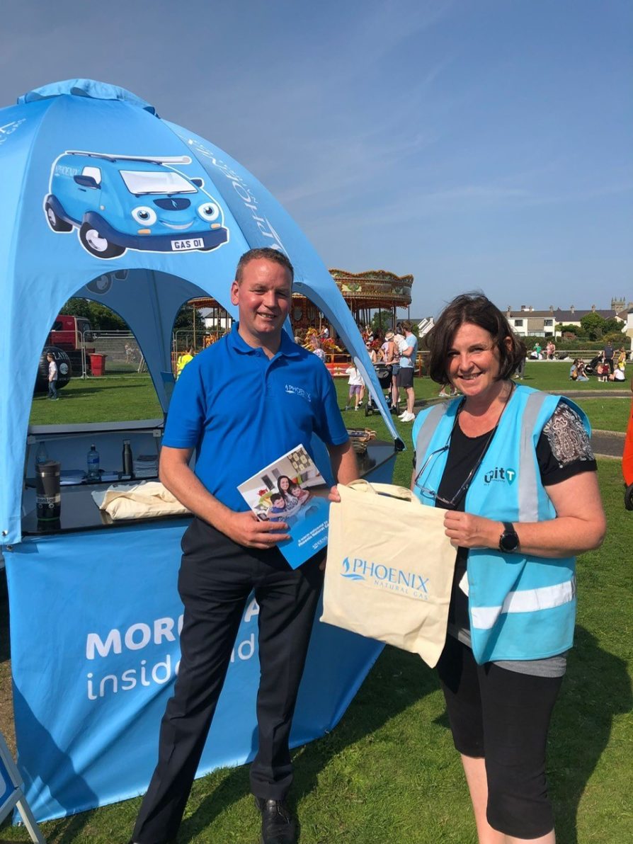 Mark Woodside, Phoenix Energy Energy Advisor, with Kathy Black, Unit T at the Castle Gardens Family Fun Day which was supported by The Phoenix Energy Building Back Together Fund.